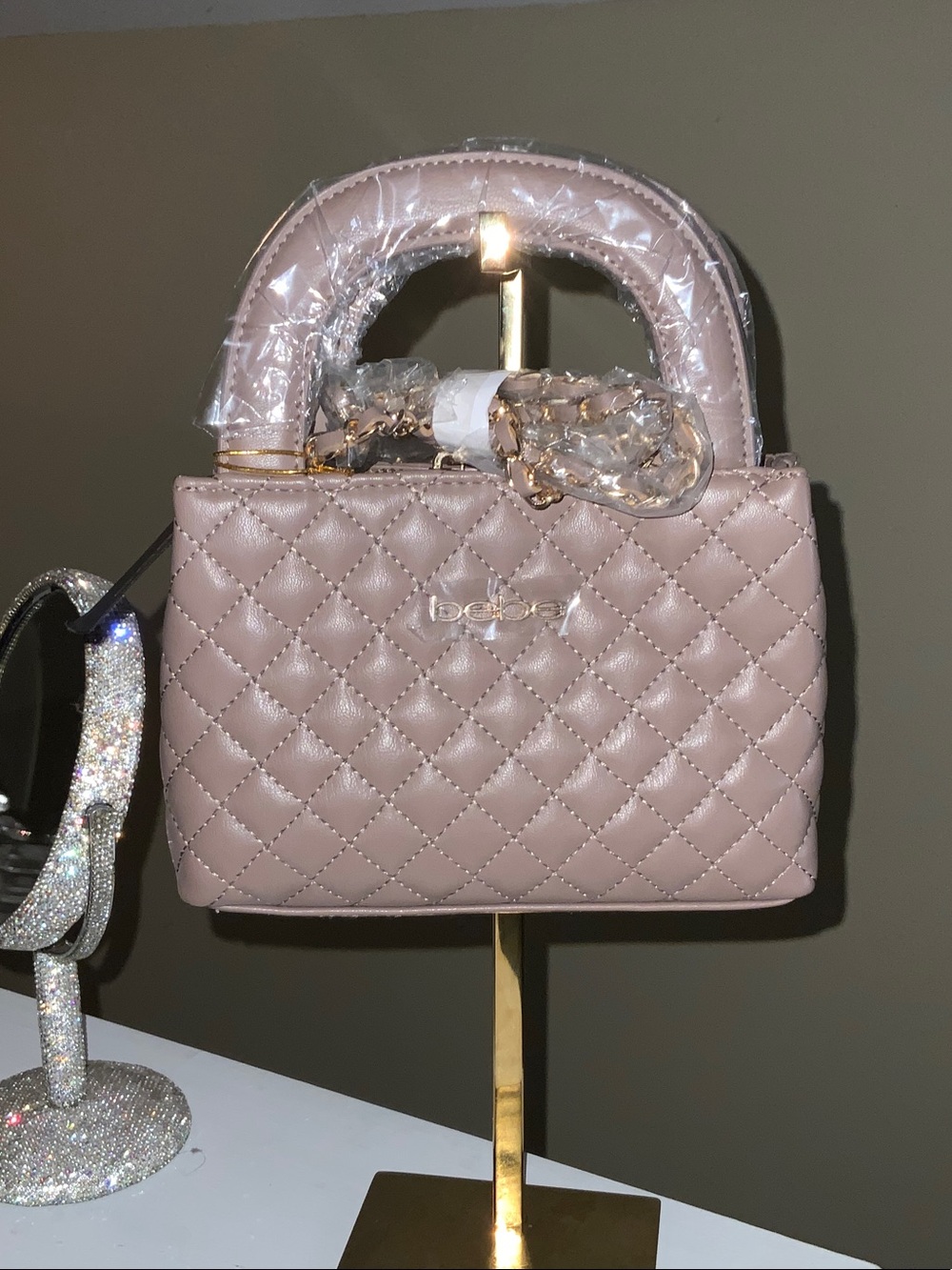 bebe Quilted Mini Top-Handle Bag in taupe
